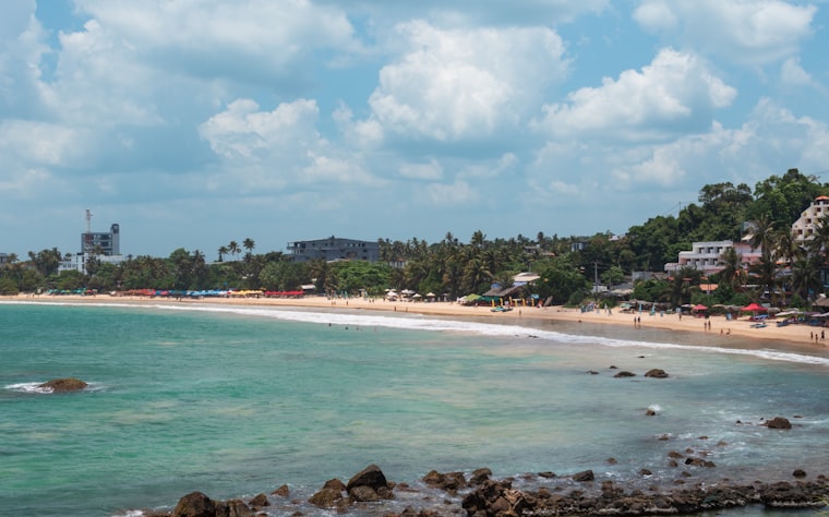 Turquoise water and sandy coastline in Sri Lanka